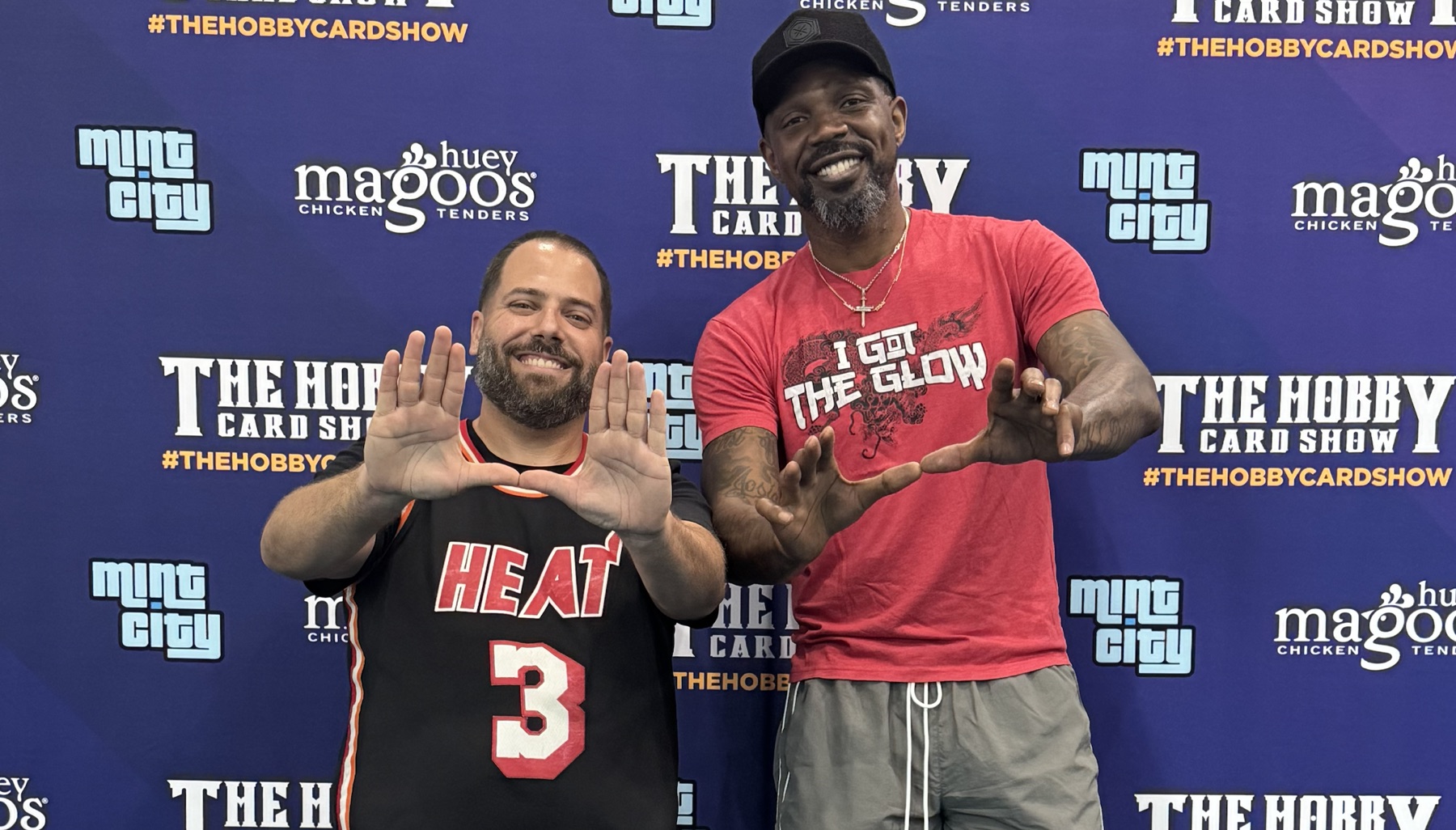 OLI SPORTCARDZ posing with a guest at The Hobby Card Show